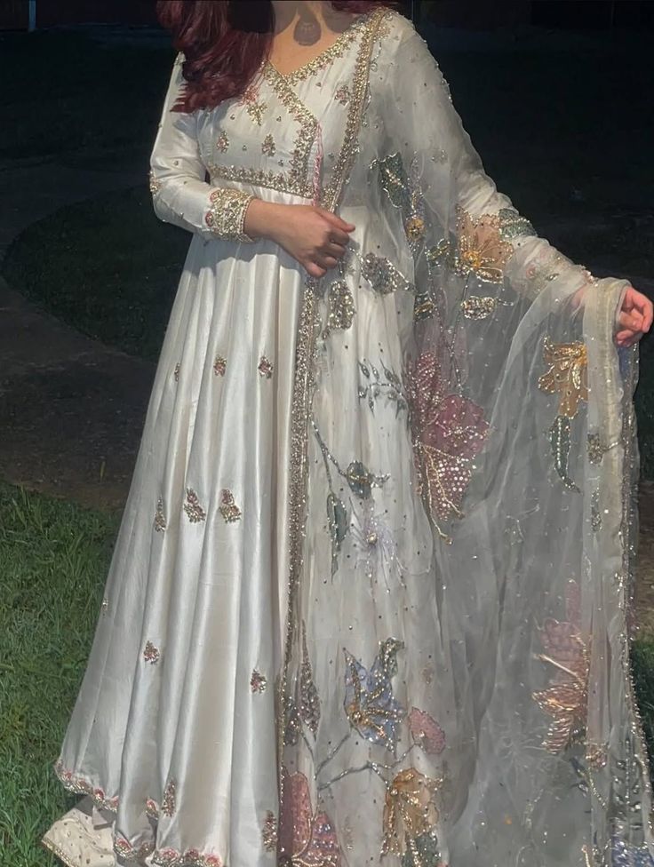 white embroidered traditional outfit